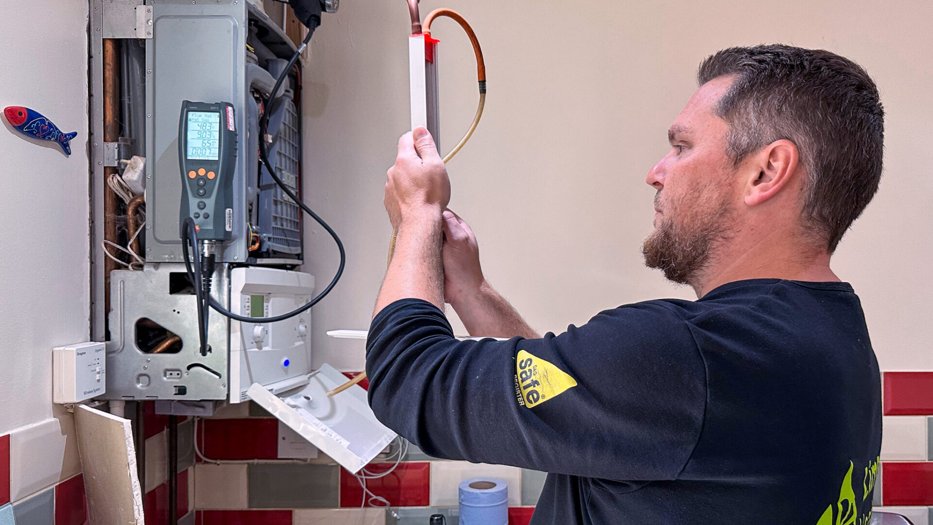 Steve, a Lime Heating gas engineer carrying out a gas boiler service