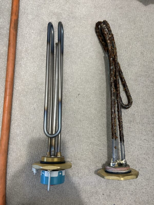 New and old immersion heaters, side by side. The old one is corroded and damaged by limescale. It has been replaced by Lime Heating.