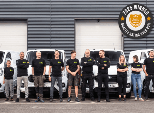An image that features the Lime Heating team with the award sign